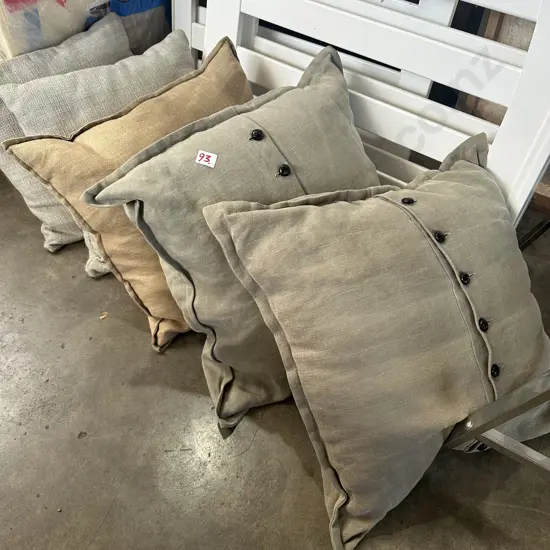5 neutral hue cushions, 1 with feather fill