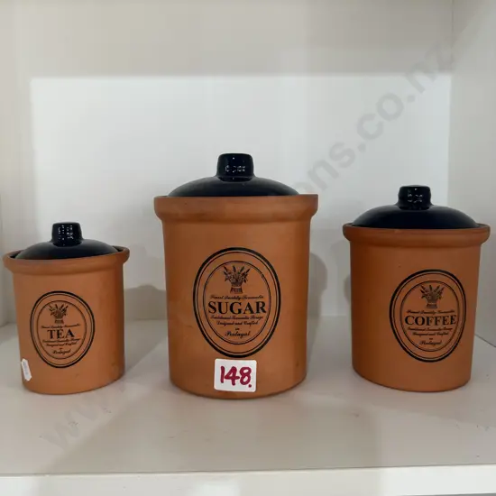 Set of three pottery jars.