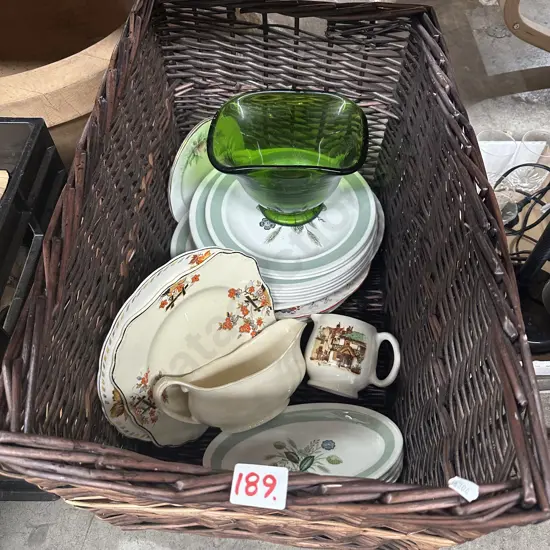 Cane basket and english plates, gravy boat etc.