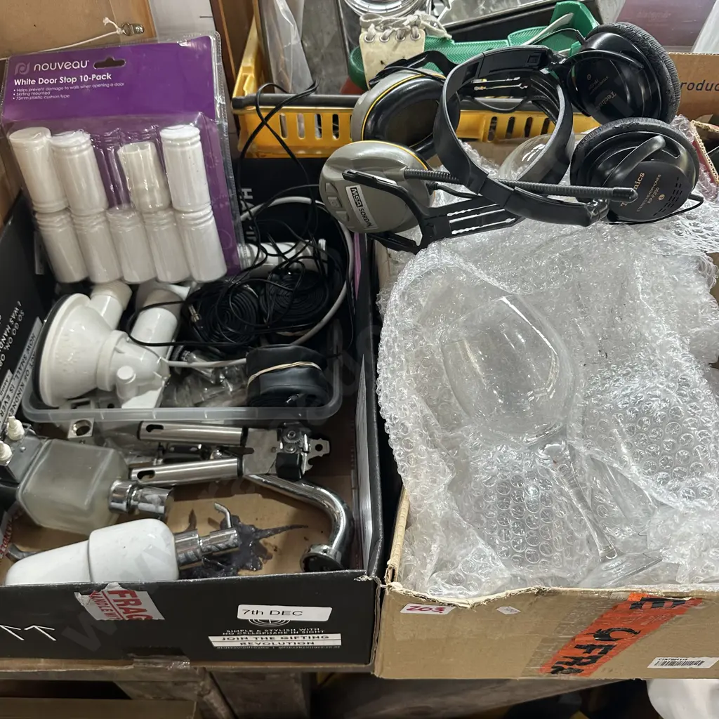 Two boxes glasses, bike tubes, door stops, headphones etc. Image 1++