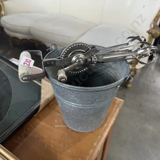 Small bucket and vintage egg beater