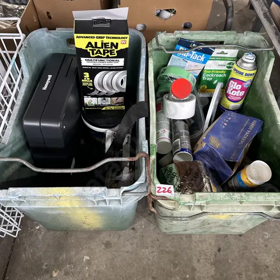 Two apple creates, cash box and hardware items.