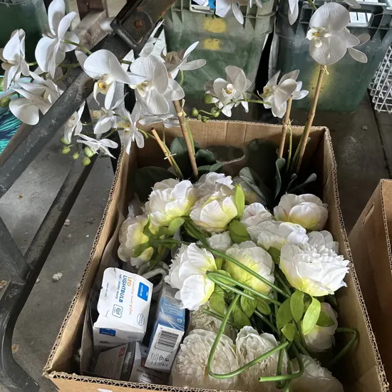 potted fake orchids, roses plus light bulbs