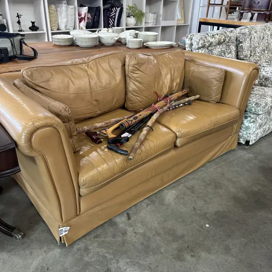 Tan leather sofa- worn