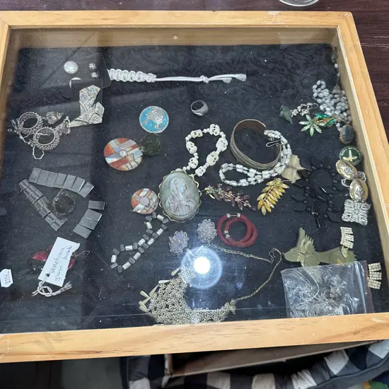 Display case and costume jewelry