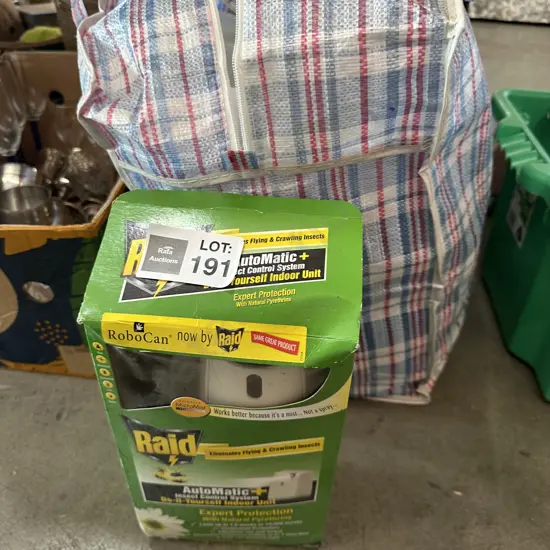 bag of kitchenware plus Raid dispenser