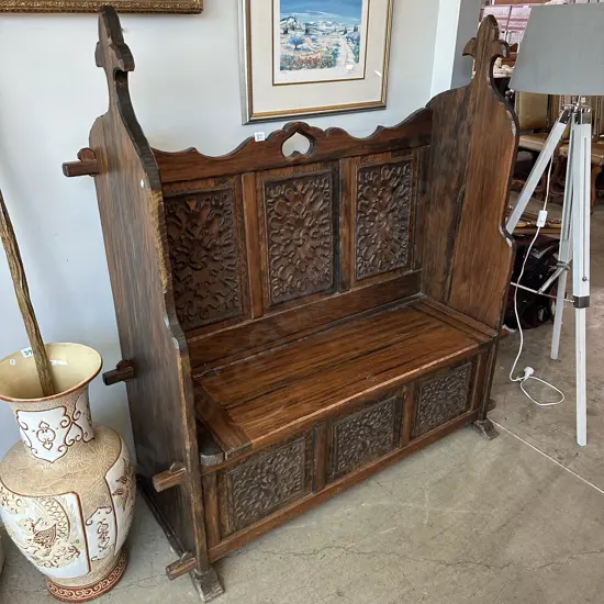 Hall seat carved by NZ sculpture Tony Greaves 1300w