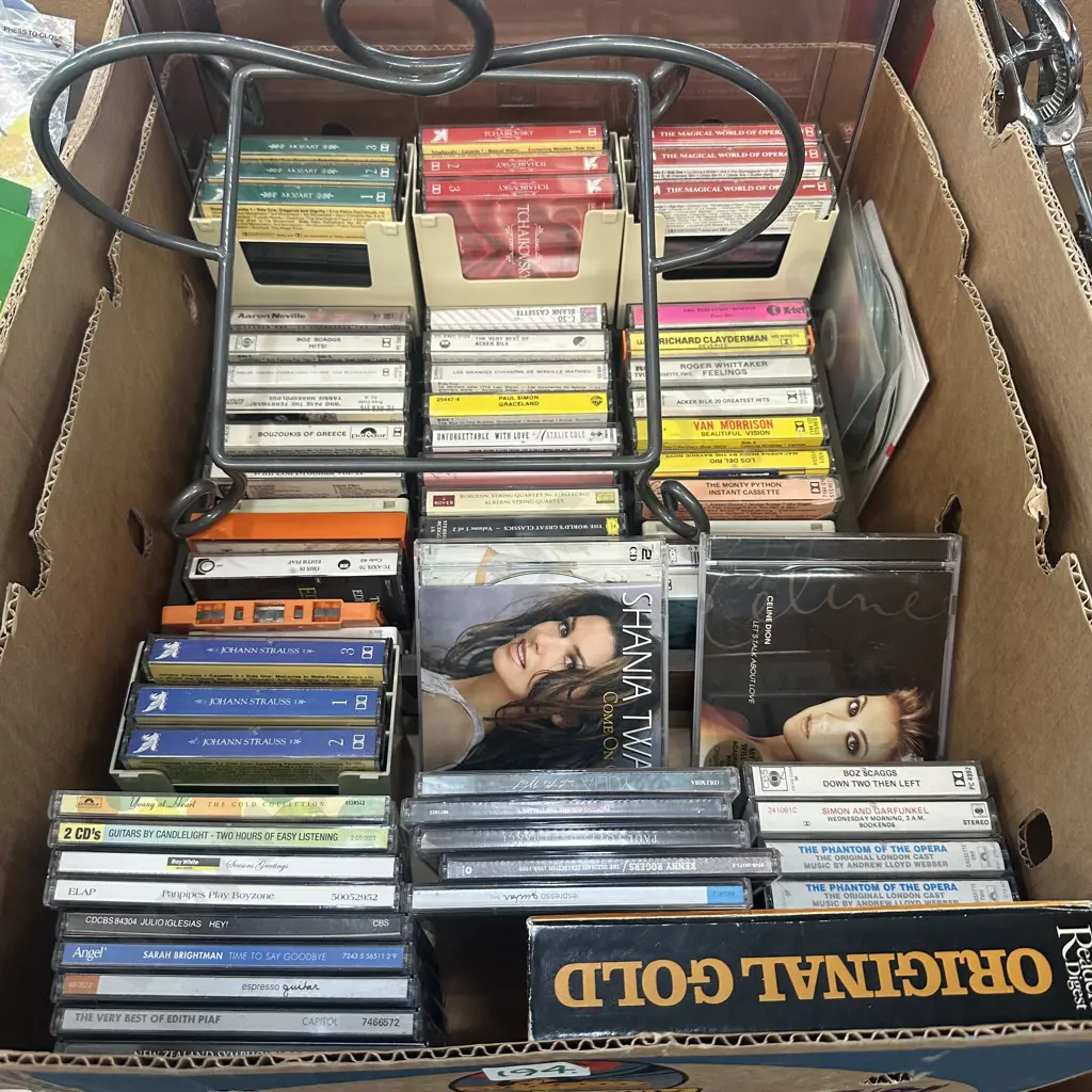 Cassettes, CDs and rack. Image 1++