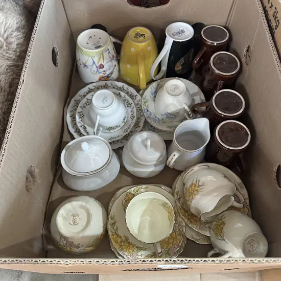 Box of cups and china sets.