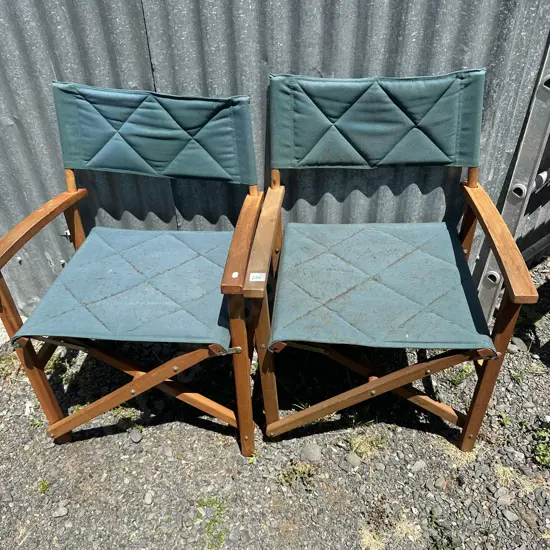 Two folding chairs.