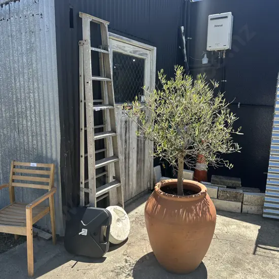 7 Foot ladder and two umbrella stands