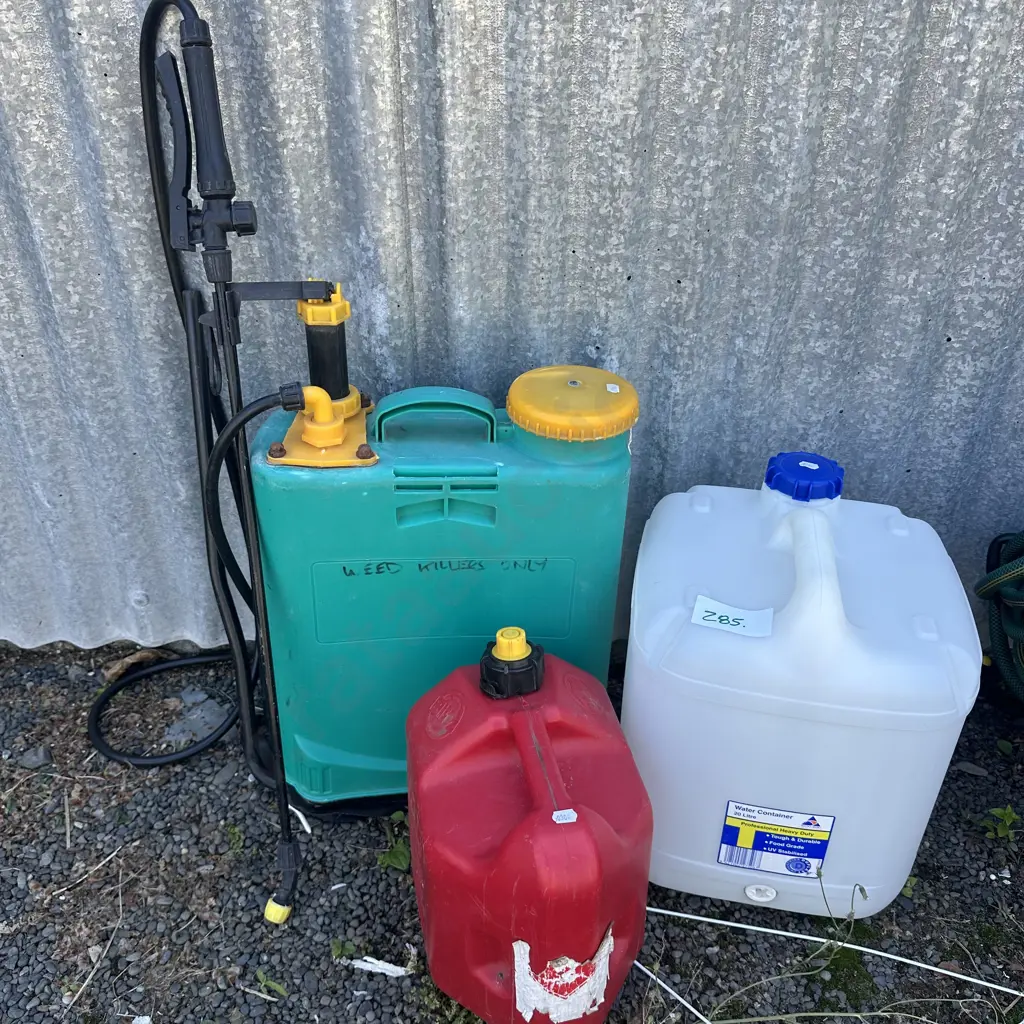 Sprayer, petrol and water containers. Image 1++