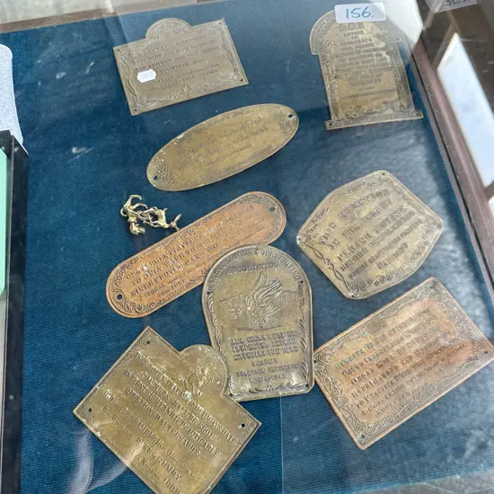 Early brass signs with funny sayings