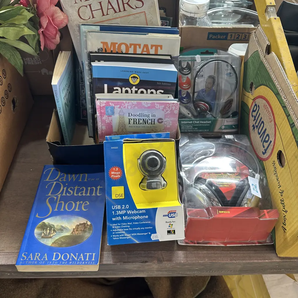 Books, new headphone sets and webcam. Image 1++