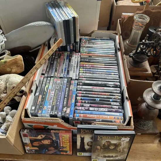 Large box of DVD movies.