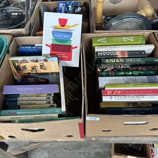 Two boxes of cookbooks.