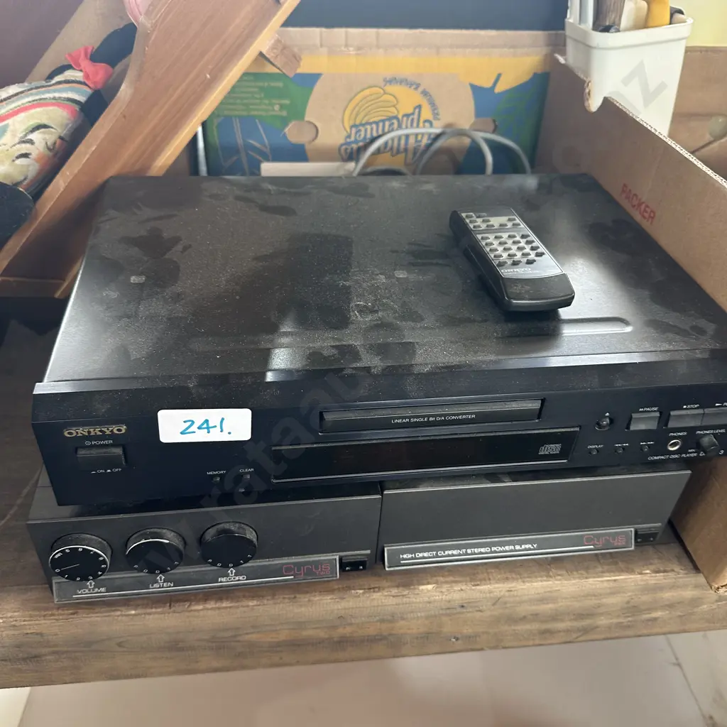 Amplifier and Onkyo CD player with remote. Image 1++
