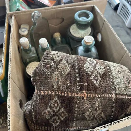 Rug and display bottles etc.