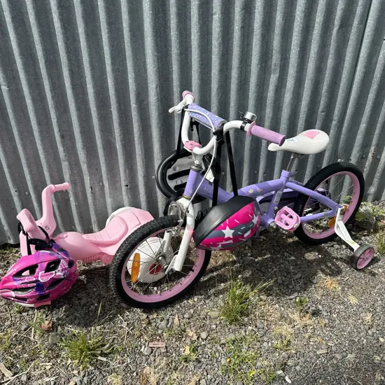 Great condition kids bike and three wheeler plus helmets