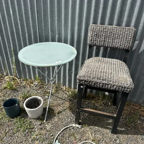 Side table, chair and planters.