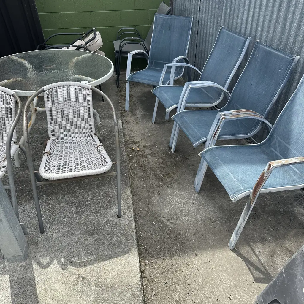 Outside table and four chairs plus two patio chairs - average. Image 1++