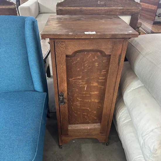 Oak cabinet on castors