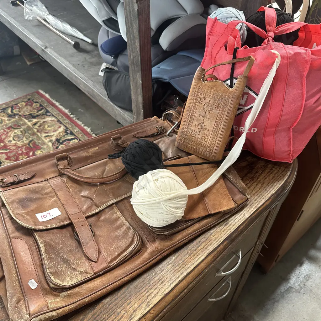 leather satchel and purse plus balls of tie Image 1++