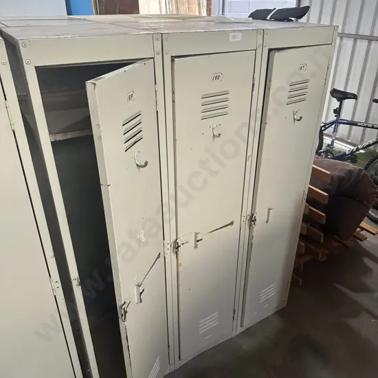3 adjoined steel lockers (1 end open)