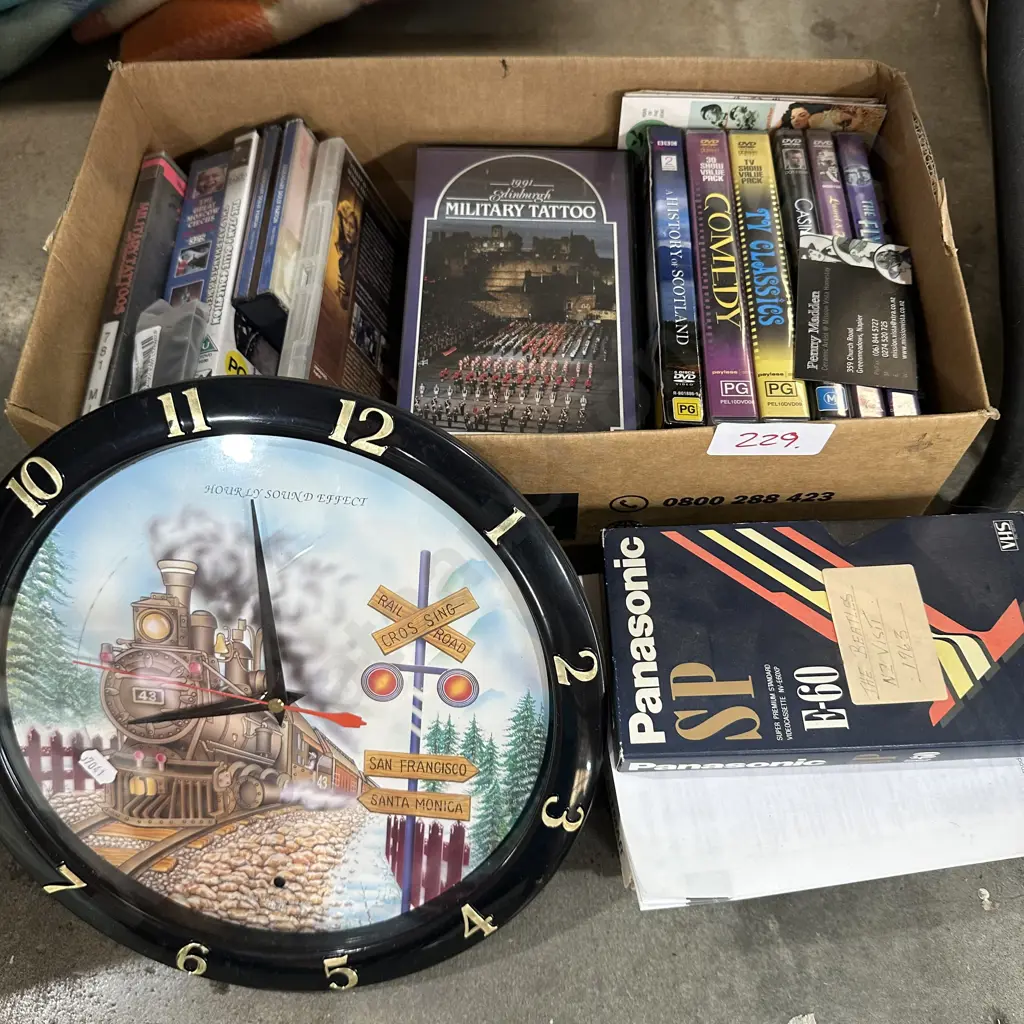 clock, DVDs and VHS Image 1++