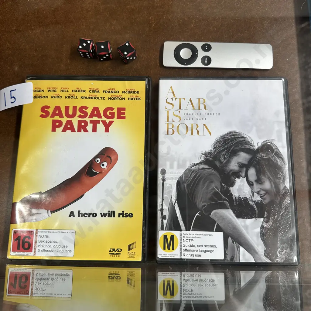 2 DVDs, apple TV remote & 3 dice... Image 1++
