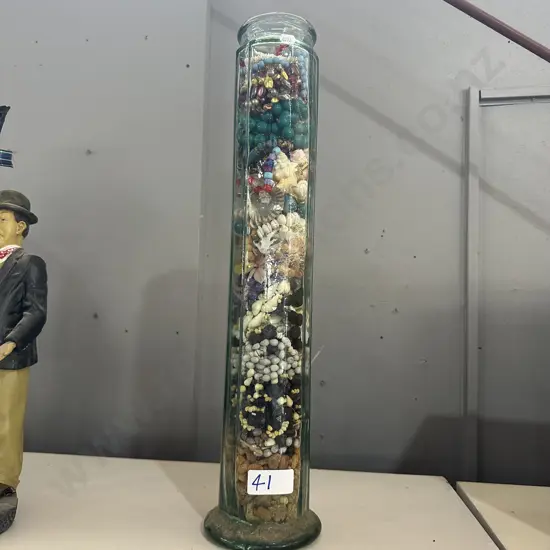 large jar full of costume jewellery