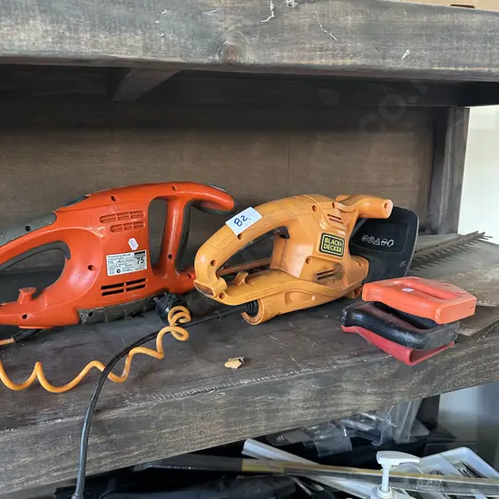2 hedge trimmers and 3 saws