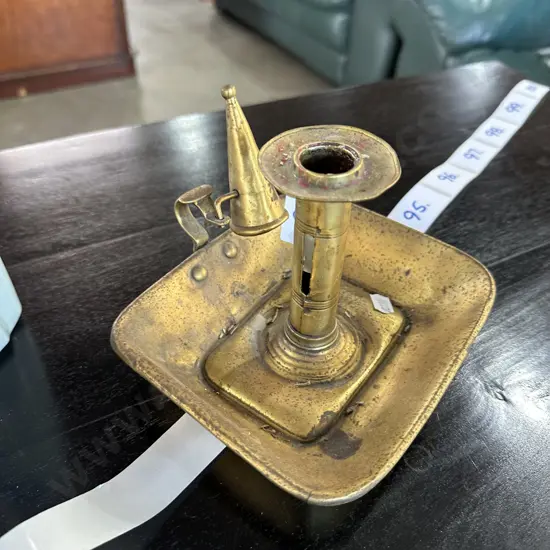antique candle stick and snuffer