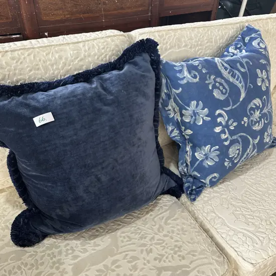 2 large feather filled cushions