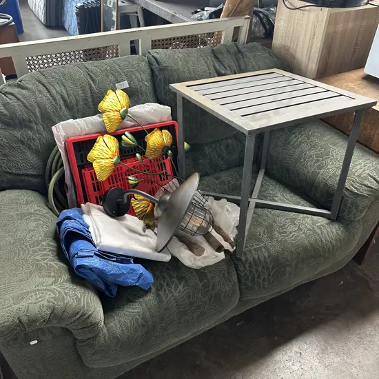 sofa, plastic bin, tarp, lamp etc plus outdoor side table