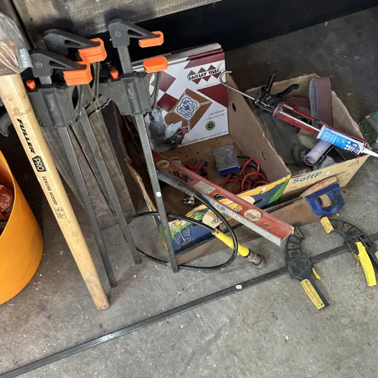 2 box tools, sand paper and machine parts