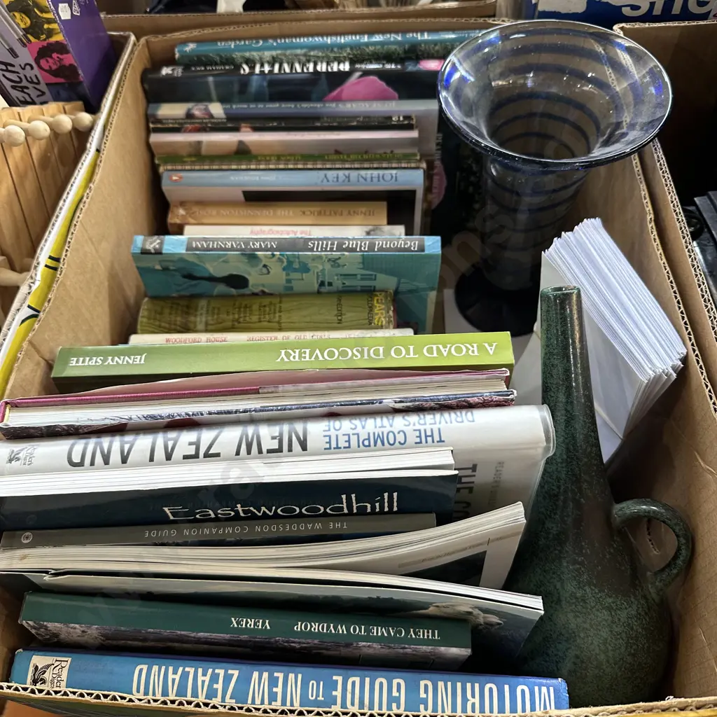 Box of books, envelopes, vases. Image 1++