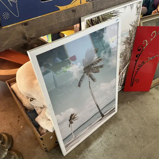 Box of towels plus pictures and art.