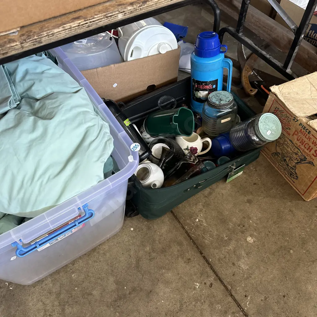 Large lidded bin with a pair of tidy single bed covers and pillowcases, plus suitcase and contents Image 1++