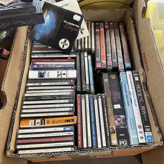 Box of CDs and DVDs