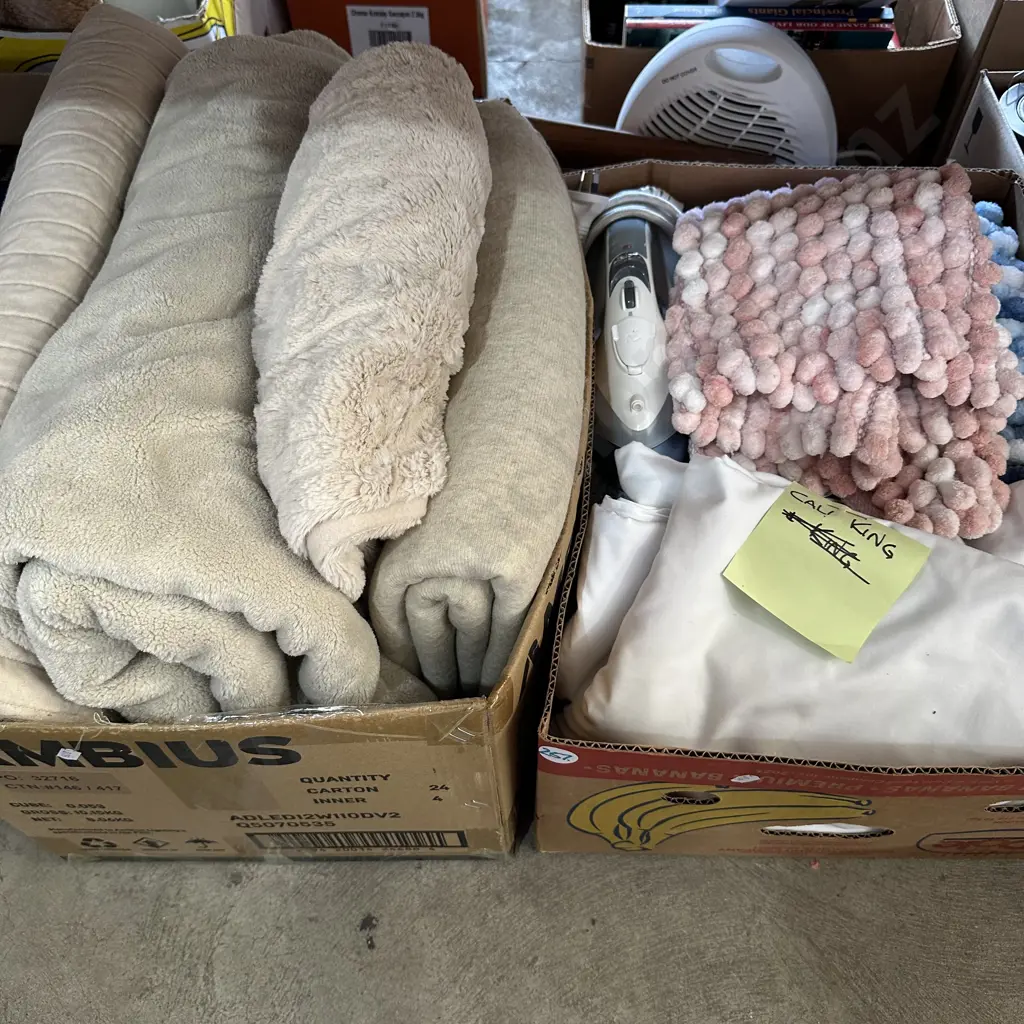 Two boxes Bath mats, iron, Californian King sheet set and blankets etc. Image 1++