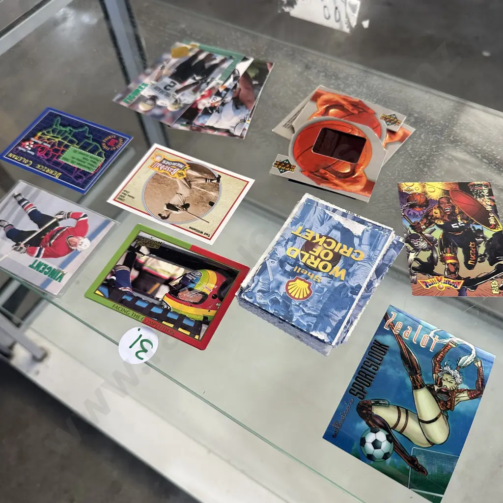 selection of different trading cards Image 1++