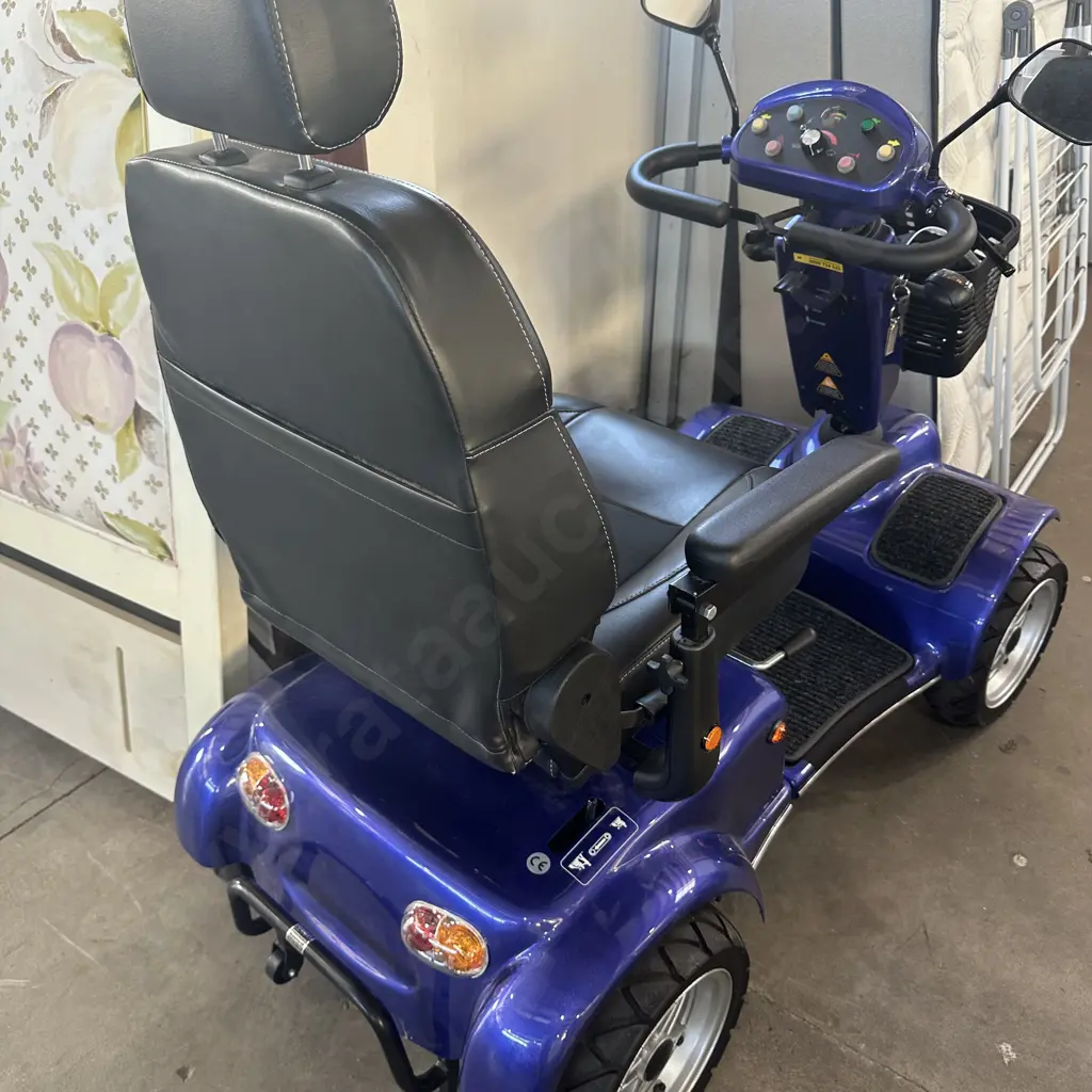 As new (virtually unused) Merits mobility scooter cost 7.5k from Hewitts Image 1++