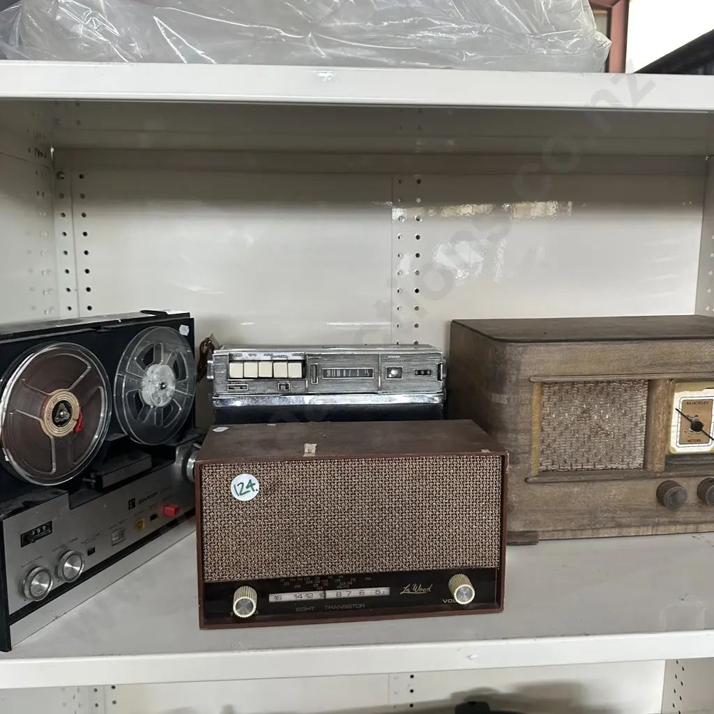 Collection of antique radios and tape to tape player. Image 1++