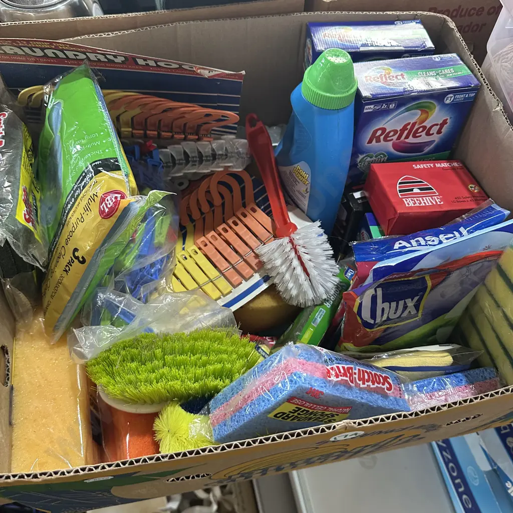 Box of new cleaning pads, brushes and laundry powder etc. Image 1++