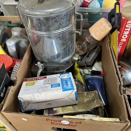 Box lot inclucing new rechargable dehumidifier, handy vac and inside aerial etc.