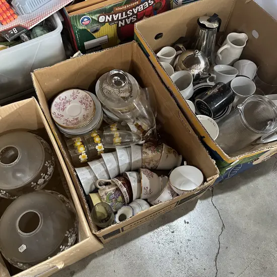 Three boxes of English china, cups and light shades etc.