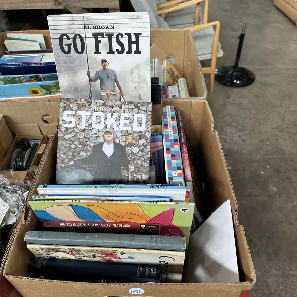 Box of books including Al Brown cooking books. Image 1++