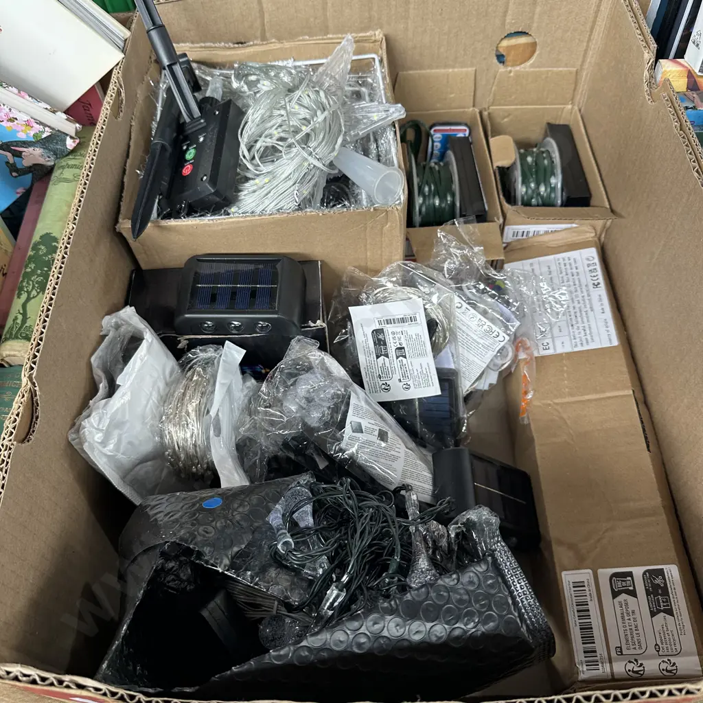 Box full of new solar lights. Image 1++
