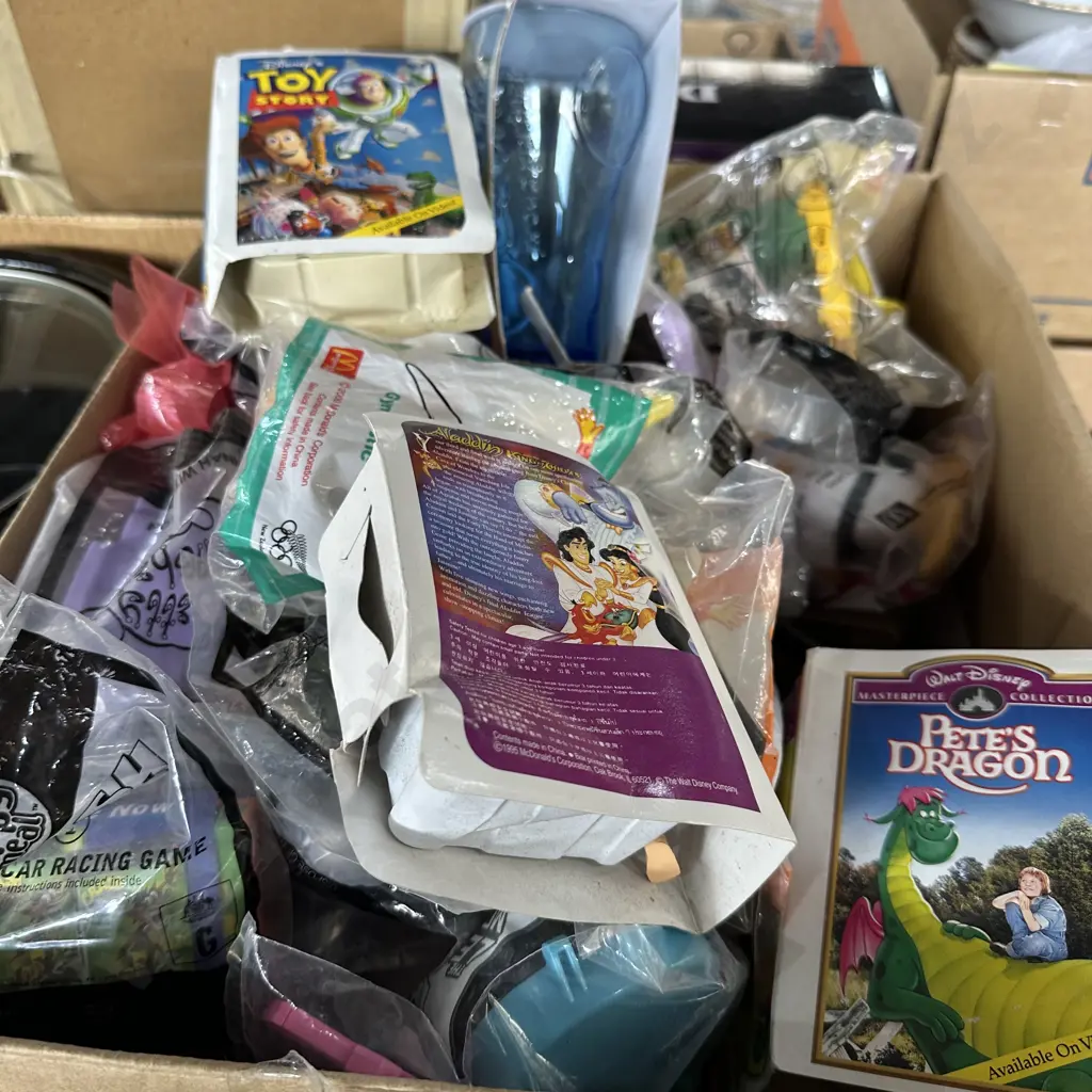 Box full of McDonalds toys and glasses in their original packets, plus some Disney. Image 1++